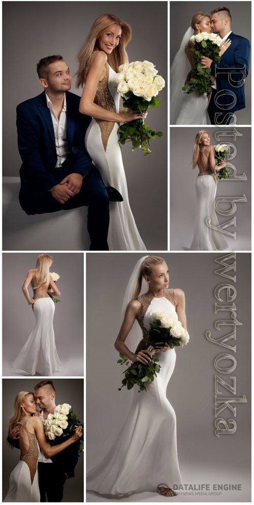 Bride and groom posing in studio stock photo